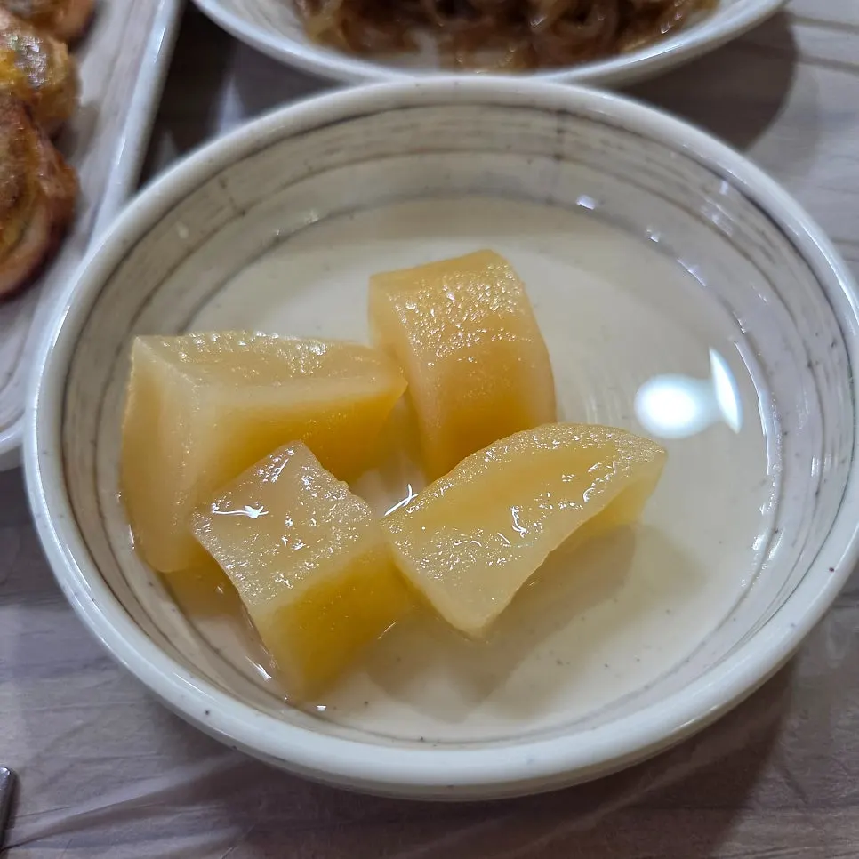 Table setting with ordered sundubu and hangover soup