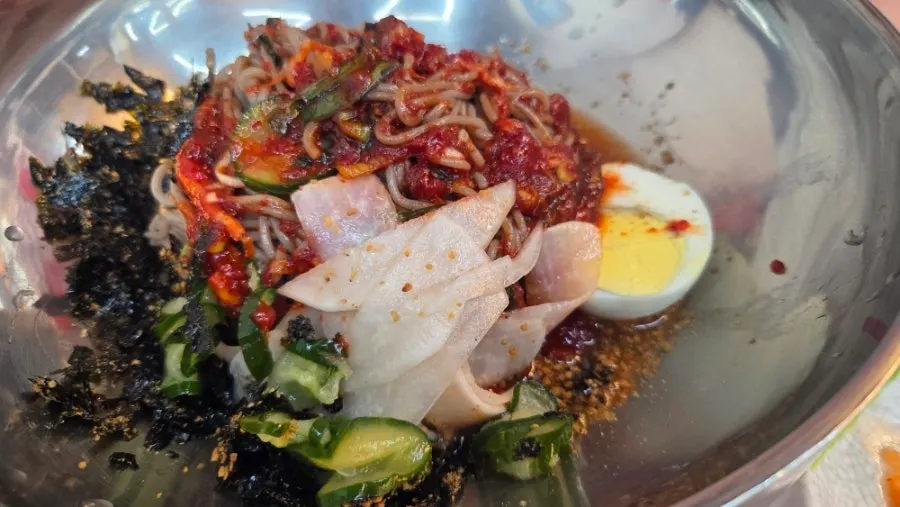 A bowl of memil (seasoned) buckwheat makguksu