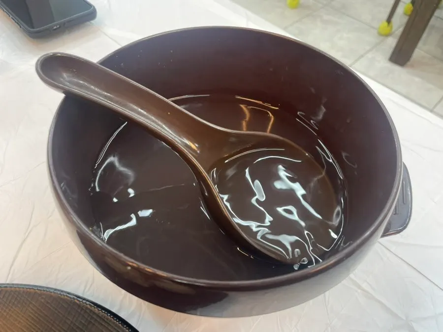 Perilla oil buckwheat makguksu with noodles lifted up