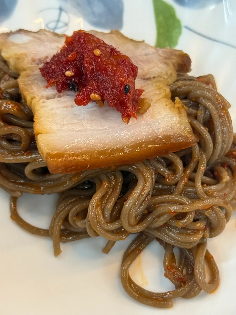 Perilla oil makguksu noodles mixed together