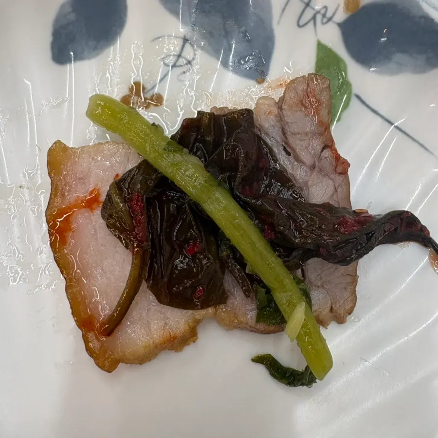 Suyuk served with spicy pepper and salted shrimp