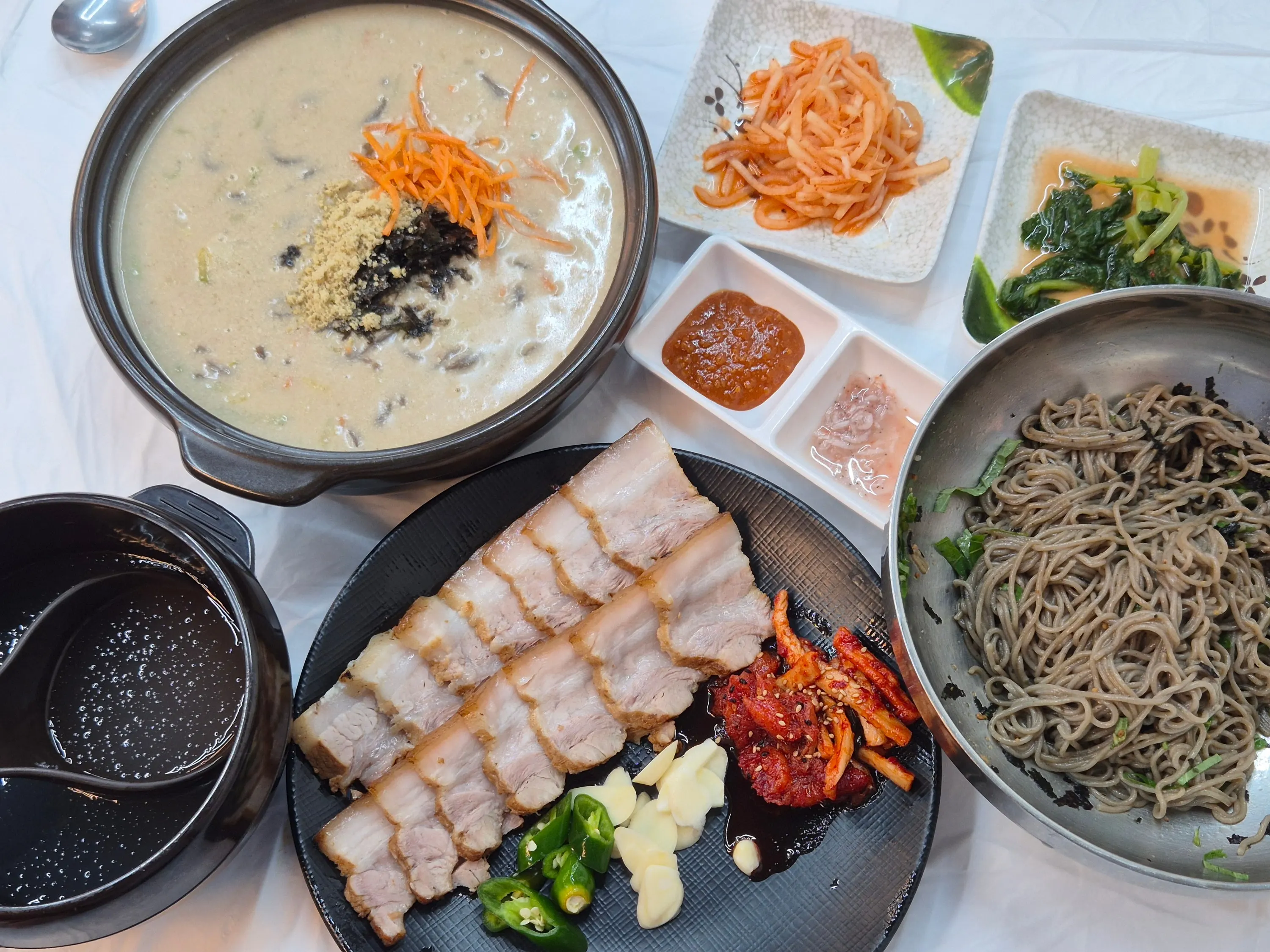 The four dishes we ordered, laid out together