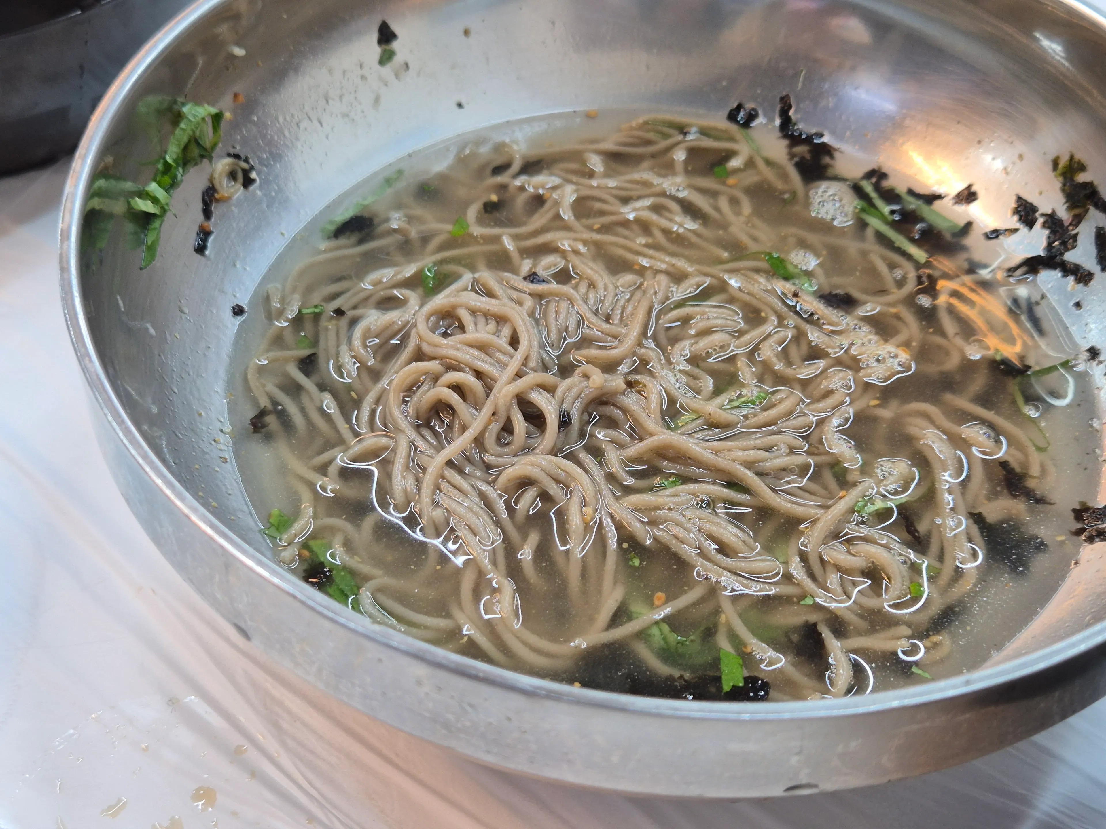 A bowl of perilla oil buckwheat noodles, deulmemak