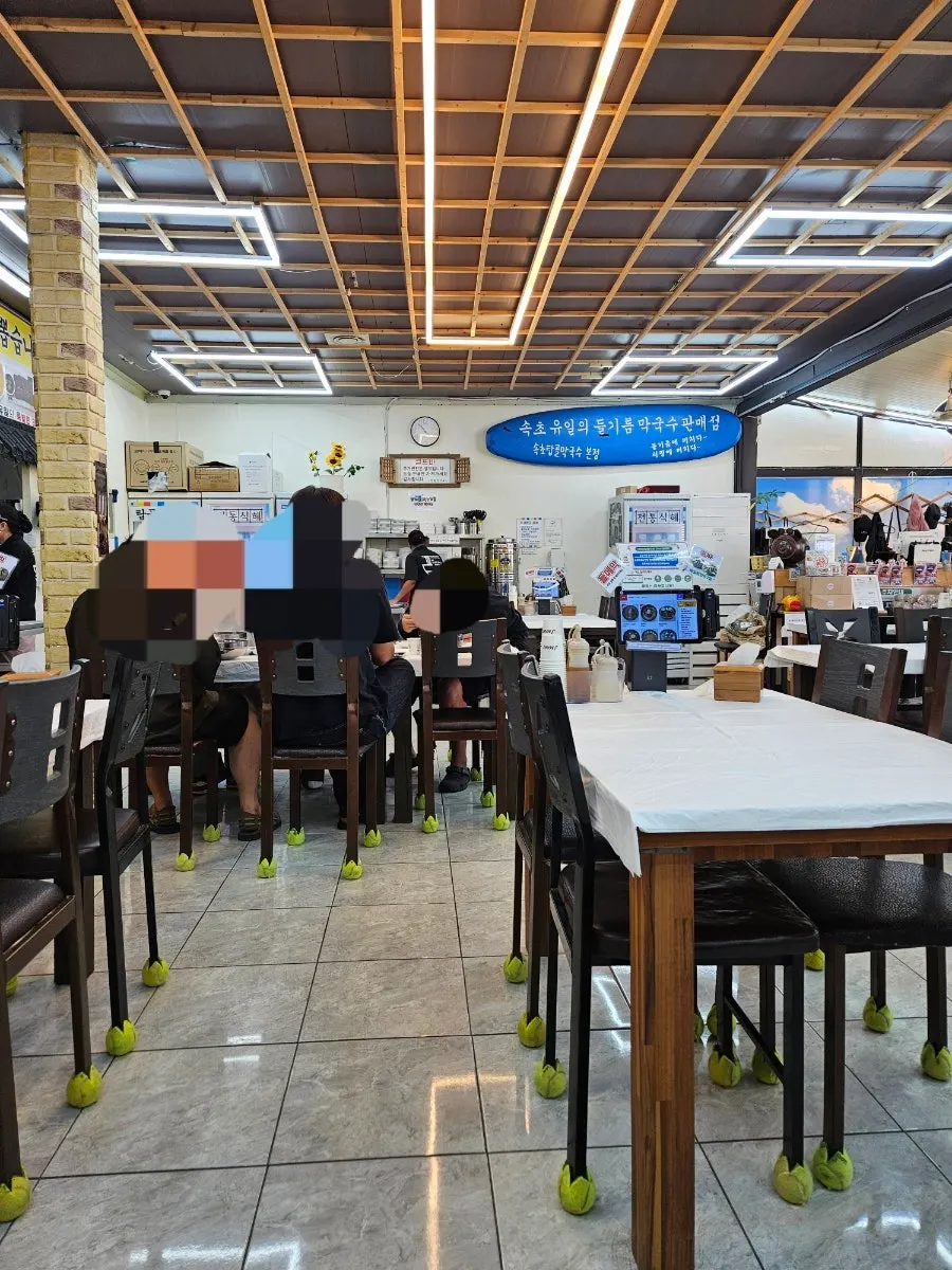 Spacious seating inside Sokcho Topgol Makguksu