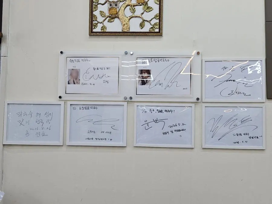 Celebrity signatures on the restaurant wall