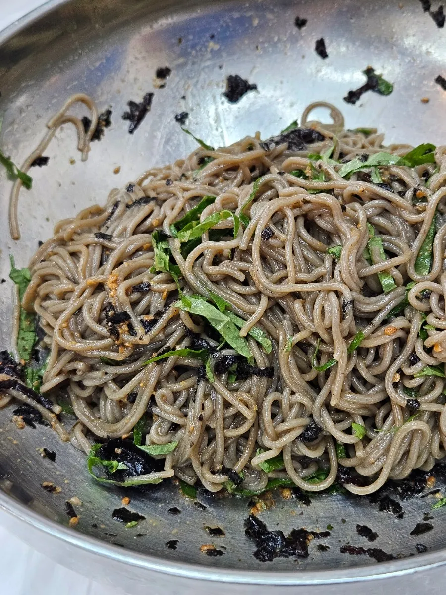 Close-up of deulmemak topped with perilla powder