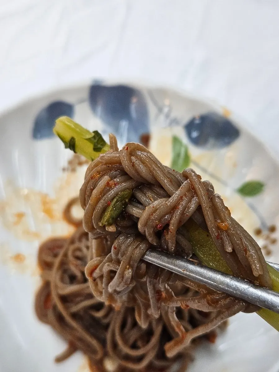 An empty, cleaned-out bowl of makguksu