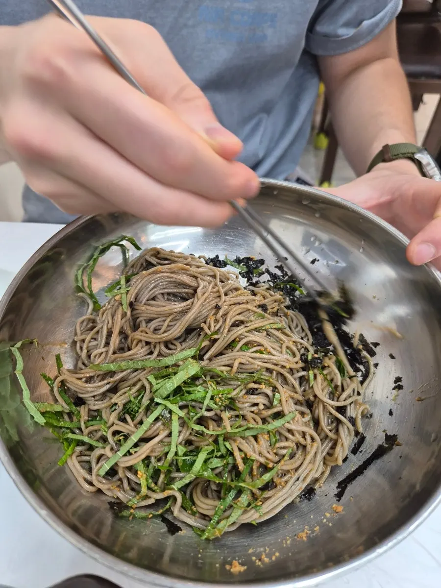 A bowl of deulmemak with fragrant perilla oil