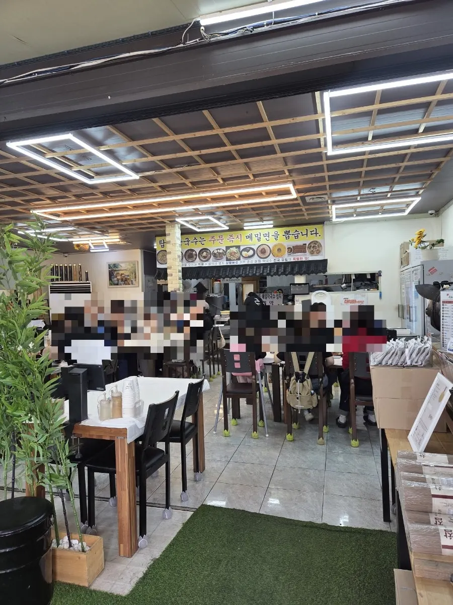 Crowded interior of Sokcho Topgol Makguksu Main Branch