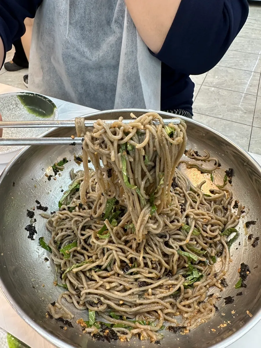 Perilla oil makguksu noodles mixed together