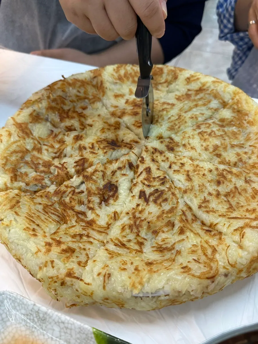 Cross-section of a crispy shredded potato pancake