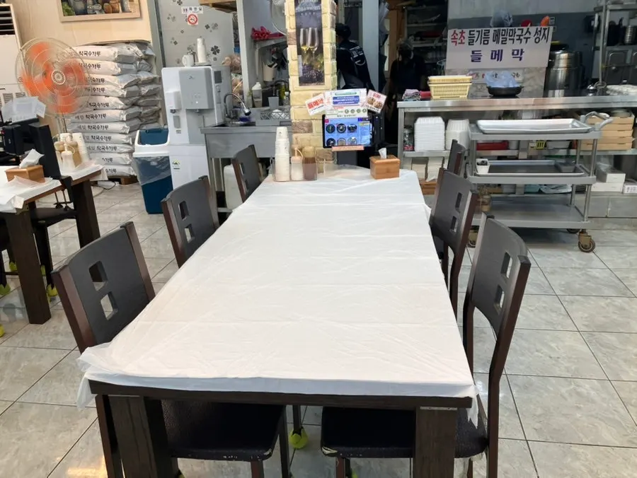 Seating area inside Sokcho Topgol Makguksu Main Branch