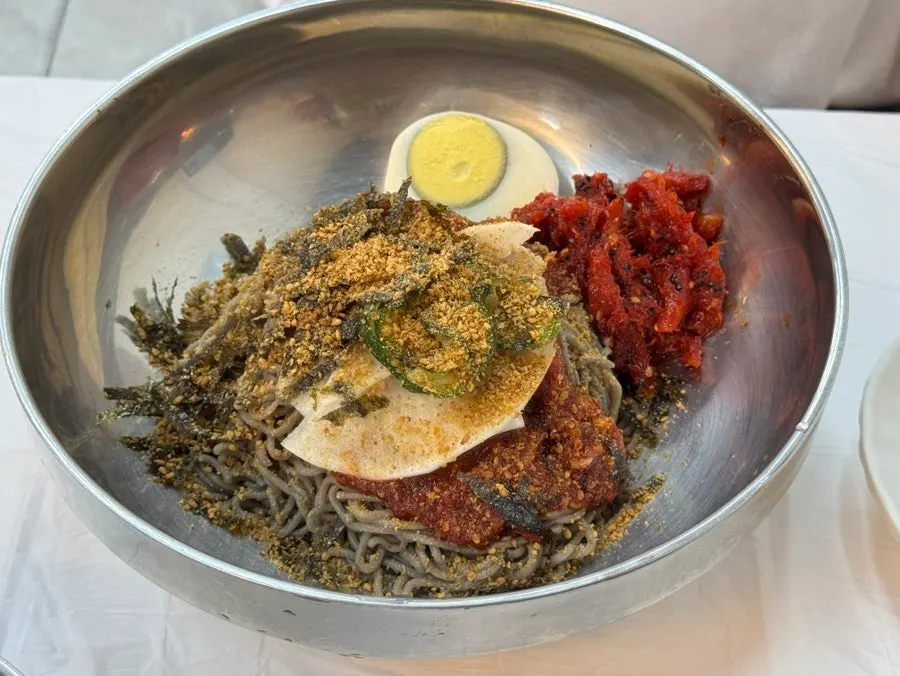 Pollack sashimi buckwheat noodles topped with pollack sashimi