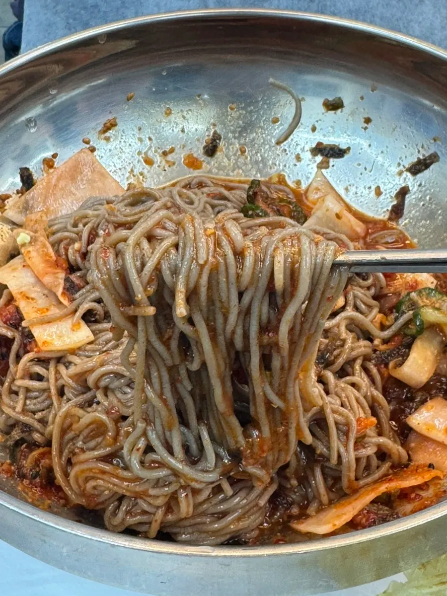 Pollack sashimi and buckwheat noodles mixed with sauce
