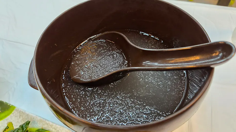 Mixing the nutty perilla oil buckwheat makguksu