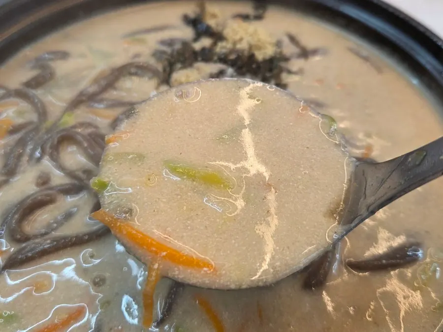 Kalguksu broth loaded with perilla seeds