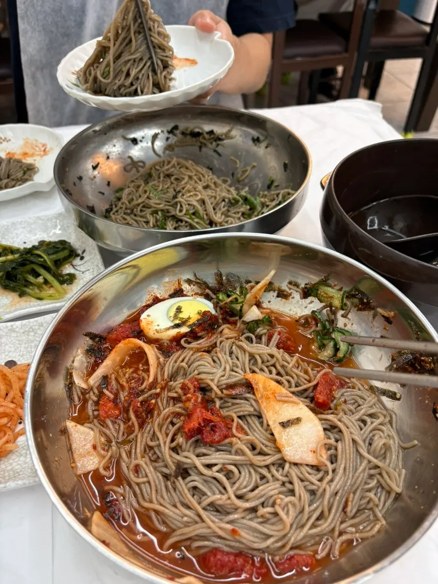 Interior seating area at Sokcho Topgol Makguksu Main Branch