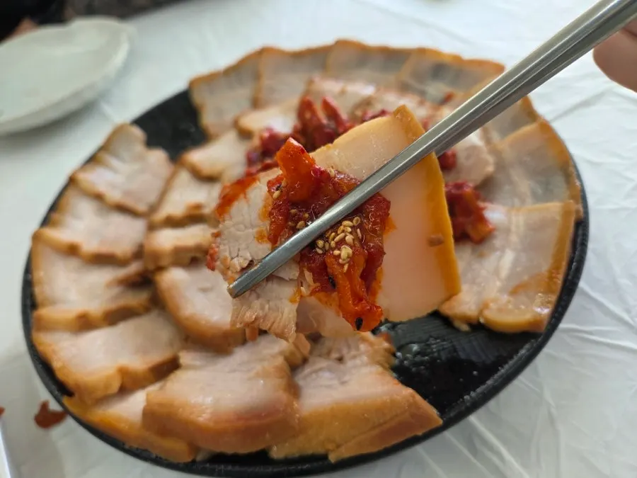 Dried radish strips and pollack sashimi salad served with the suyuk