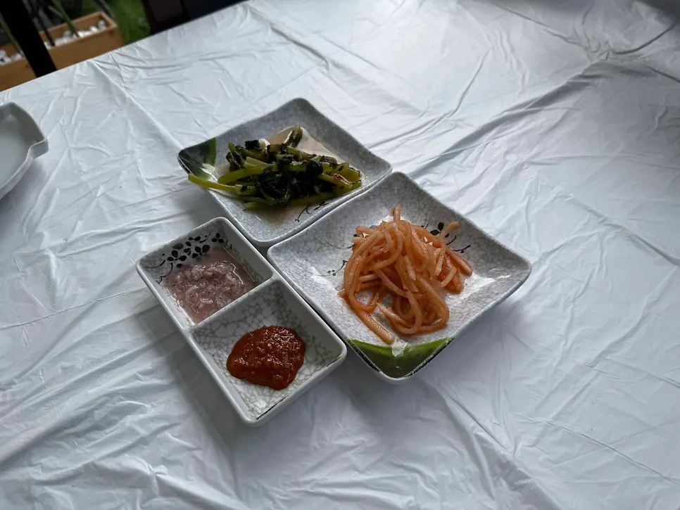 Basic table setting with julienned radish and yeolmu kimchi