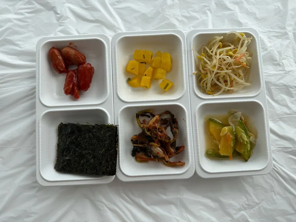 A neatly arranged spread of basic side dishes