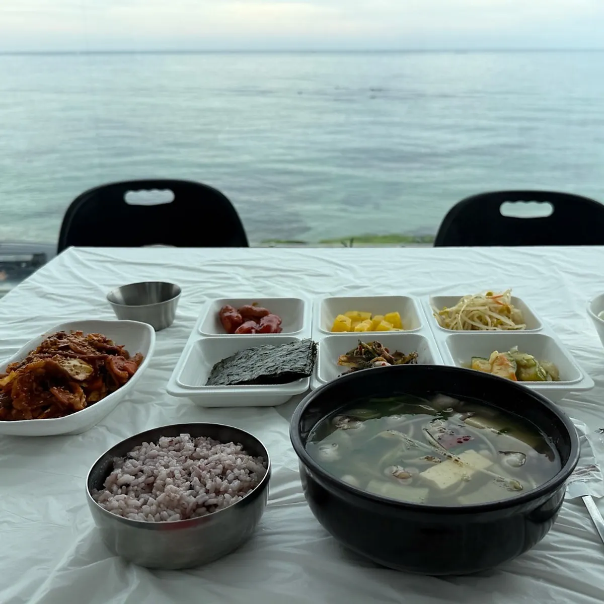 Breakfast eaten by a window overlooking the sea