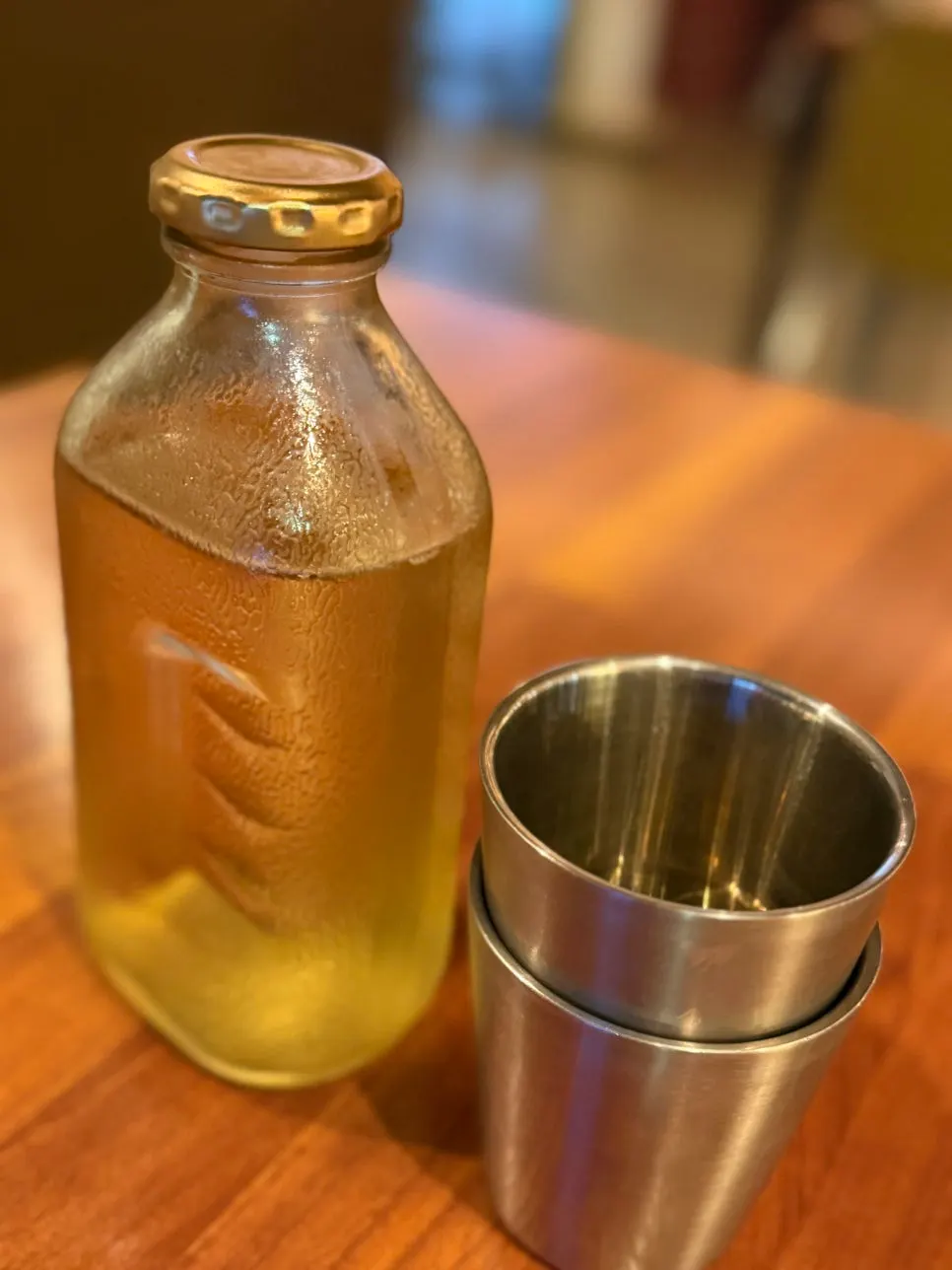A mini Del Monte water bottle on the table