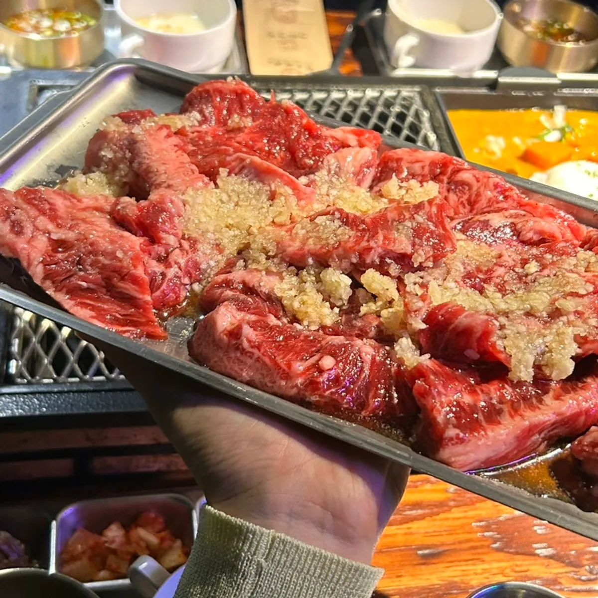 A plate of raw hwangje neukgansal (premium short rib) at Supsok Oki Jip