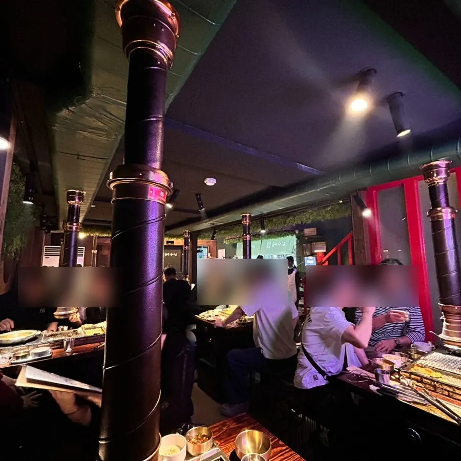 Restaurant interior full of weekend afternoon customers