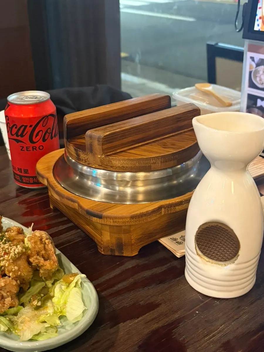 Meal with pot rice, soup and salad