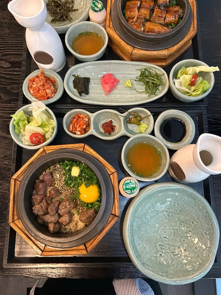 Pot rice with lid open and steam rising