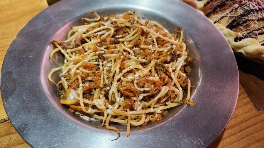 Mongolian fried rice with pork, shrimp, and bean sprouts