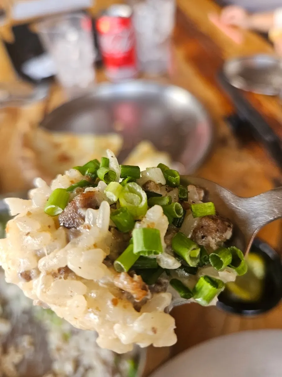 Close-up of aglio olio showing sliced garlic