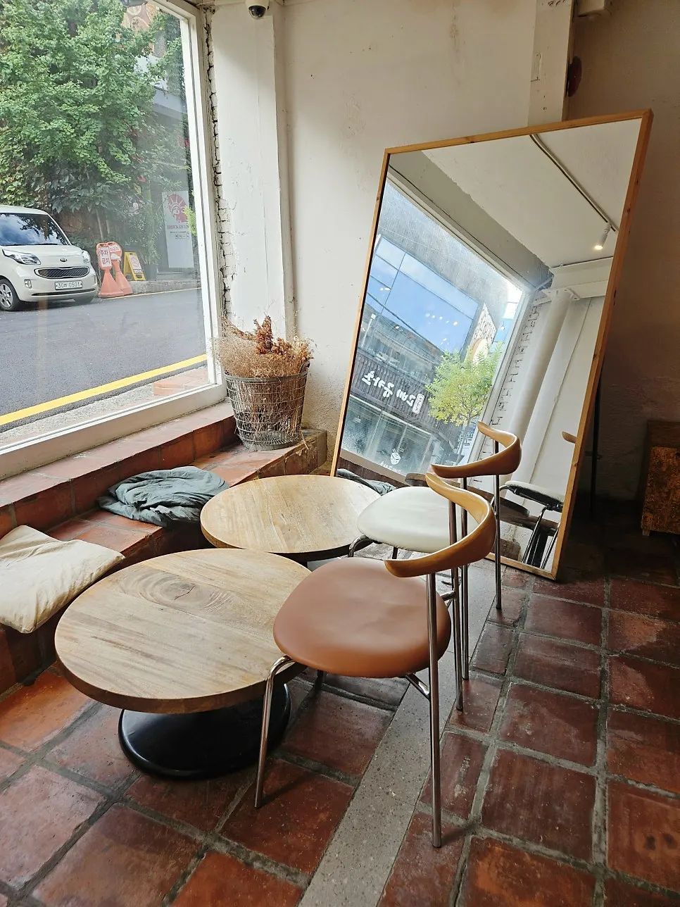 Interior of Something About Coffee with a chandelier