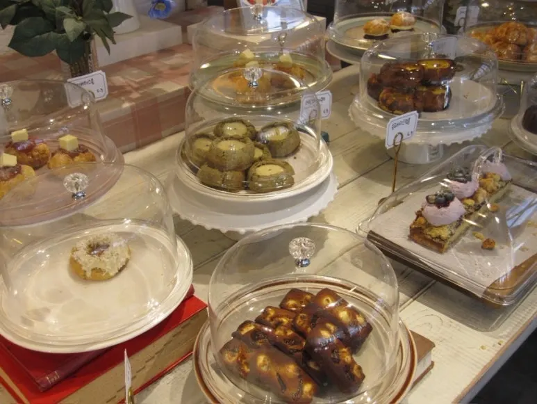 Display case of madeleines and pound cakes