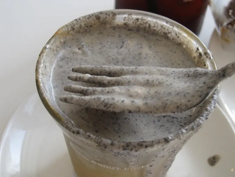 Black sesame cream latte topped with black sesame cream