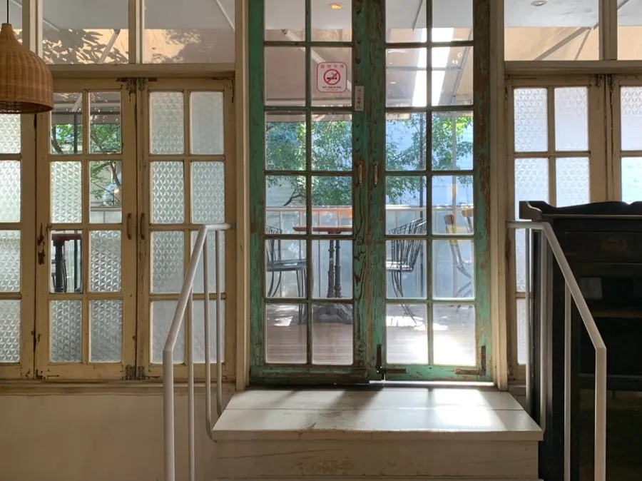 3rd floor seating in white-toned vintage style