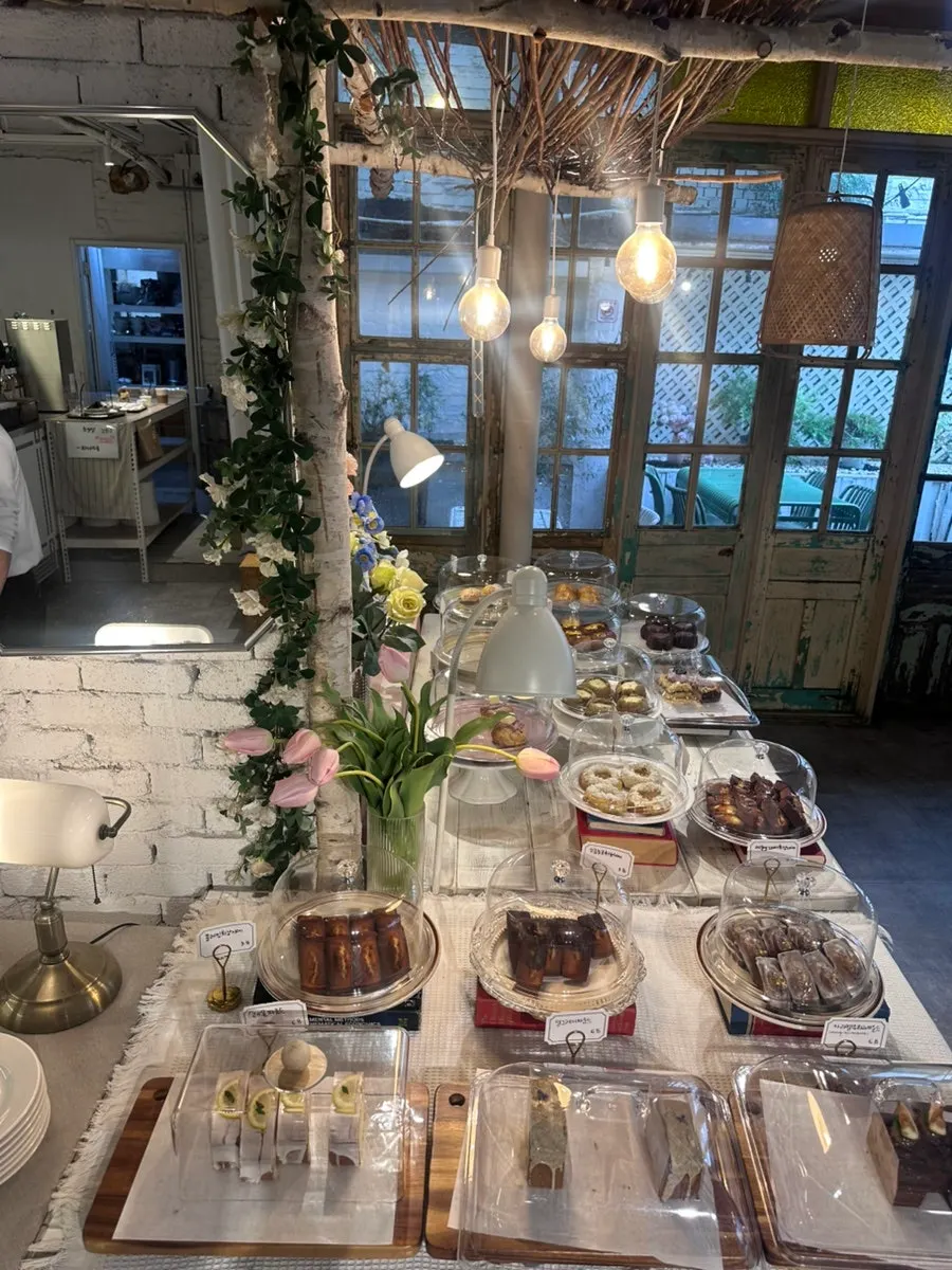 Cake showcase beside the tiled counter