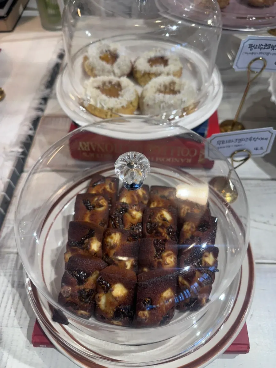 Plates of desserts displayed at Something About Coffee