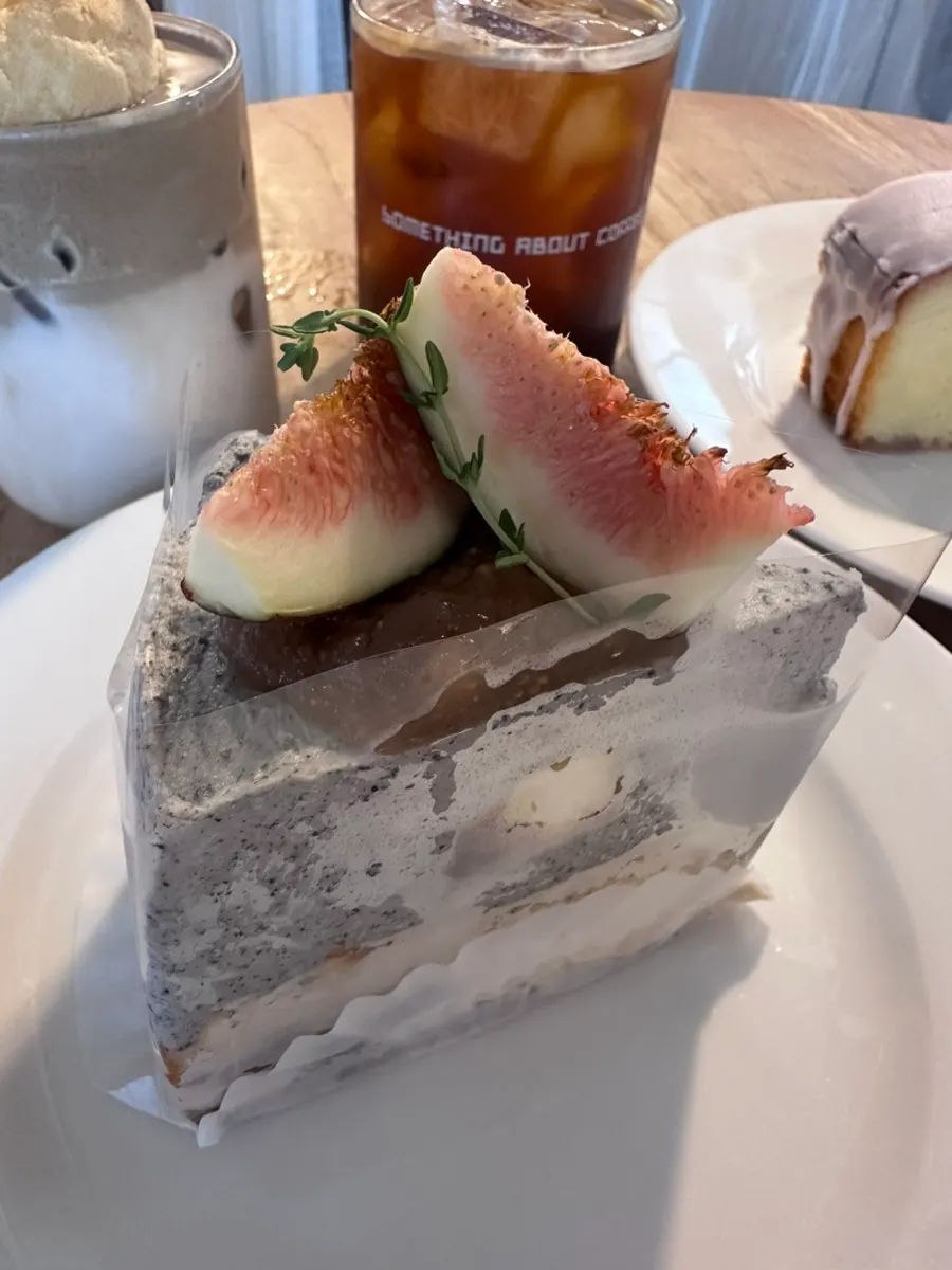Hojicha choux milk tea topped with a choux pastry