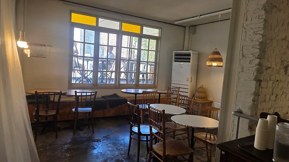 3rd-floor terrace seating with an awning