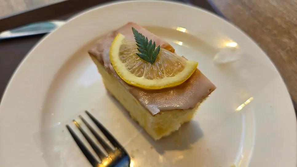 One remaining slice of lemon pound cake