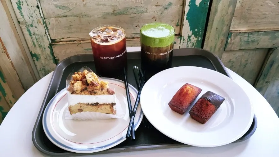 Group shot of cake, financiers, and drinks