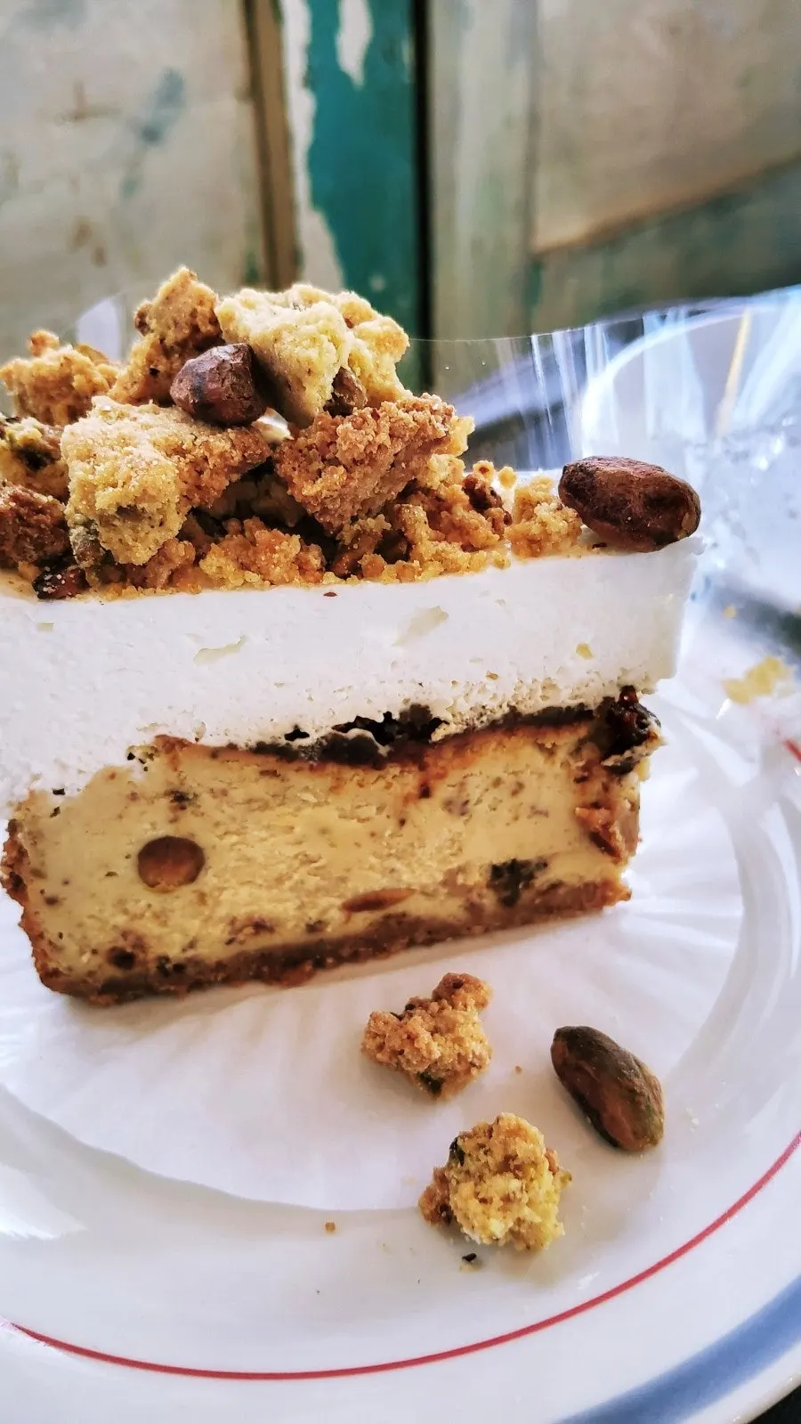 A slice of pistachio cheesecake