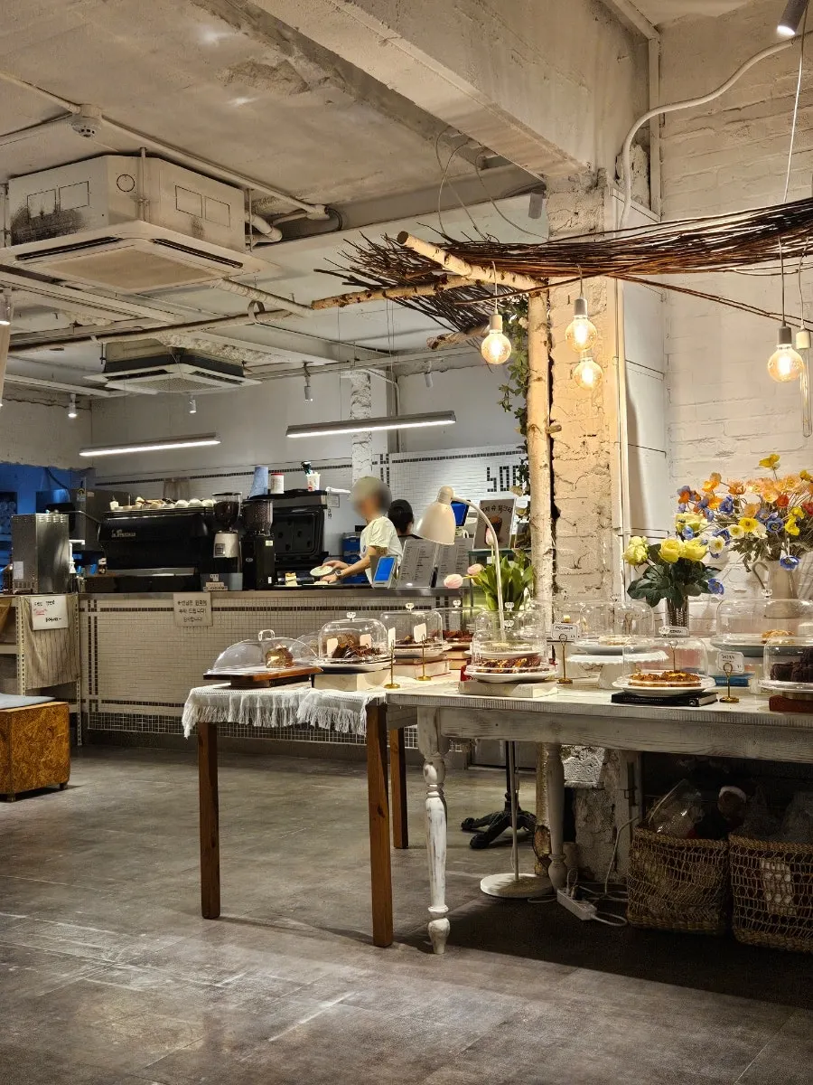 Table seating on the first floor of Something About Coffee
