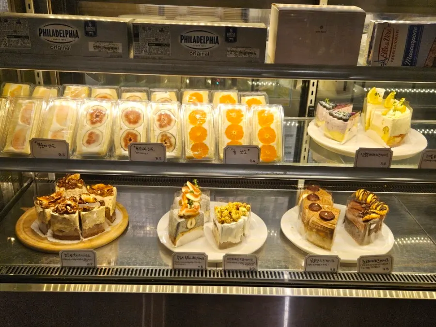 Dessert showcase with cookies and financiers on display
