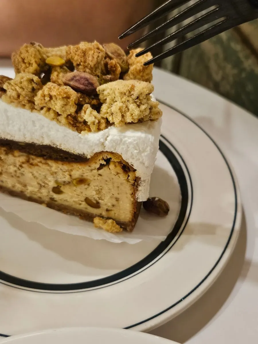 Pistachio cheese cake topped with crumble