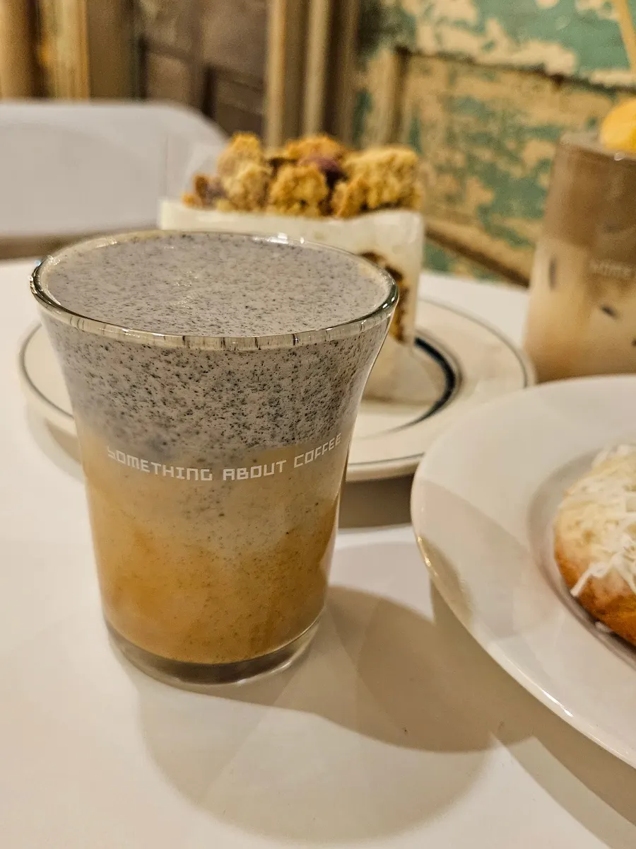 Black sesame cream latte topped with black sesame cream