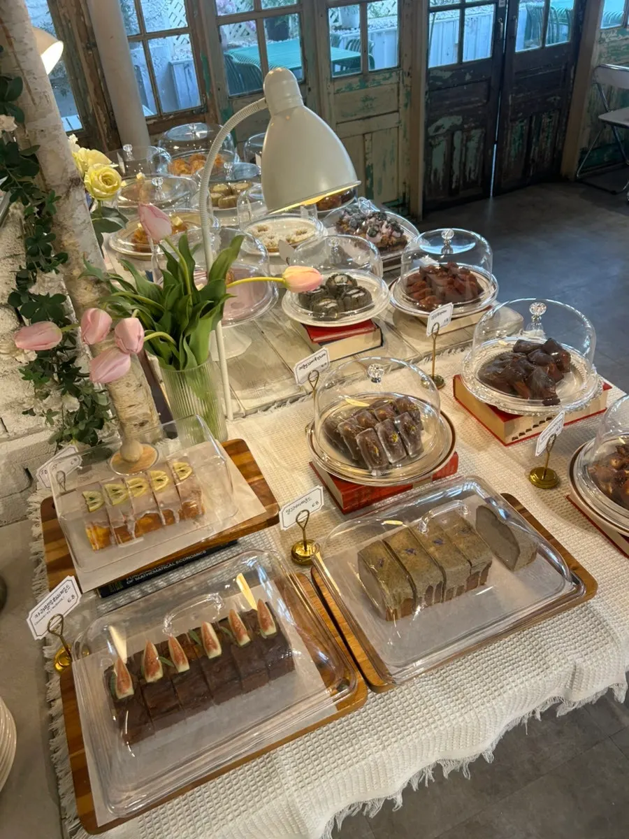 Baked goods dessert display near the counter