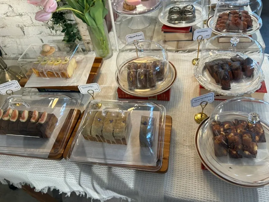 Display of egg tarts, cookies, scones and more