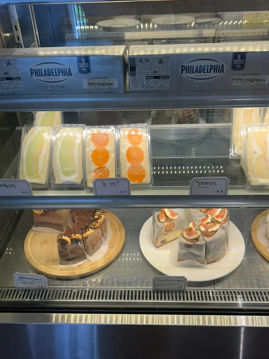Slice cakes inside the showcase fridge